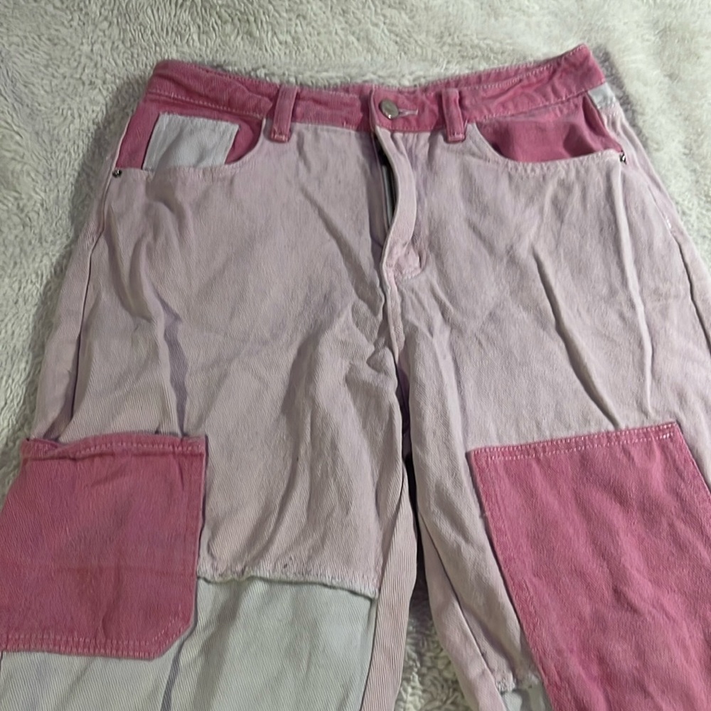 Pink and white jeans